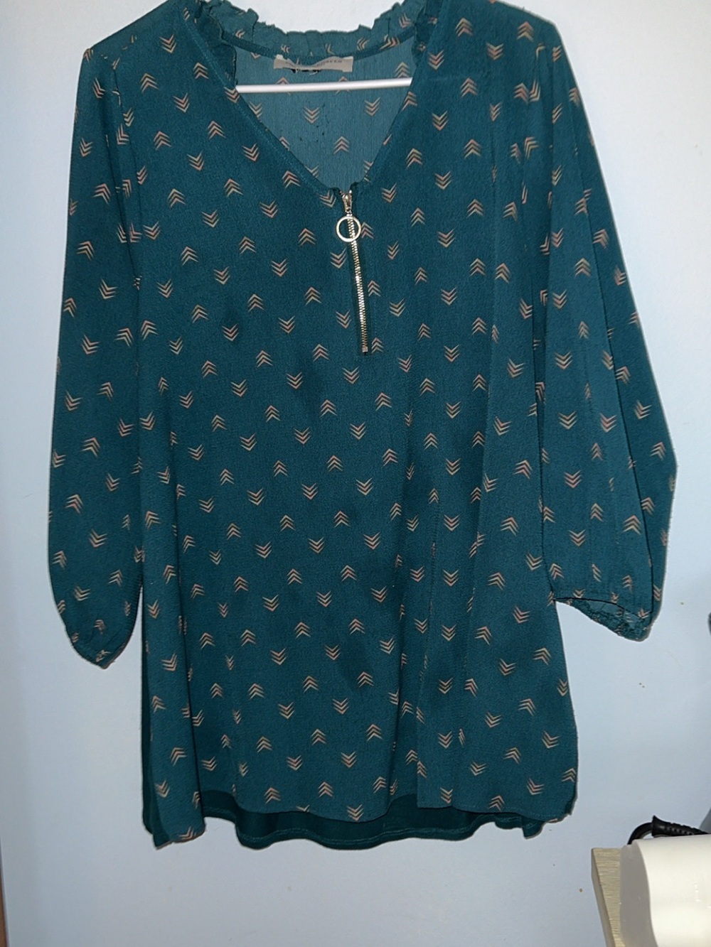 Forest green patterned blouse is from the brand Tempted Hearts 2X